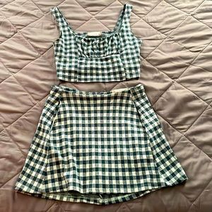 A matching crop top and skirt set.